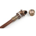 Hardwood walking stick with brass telescope and compass handle, 101cm in length.