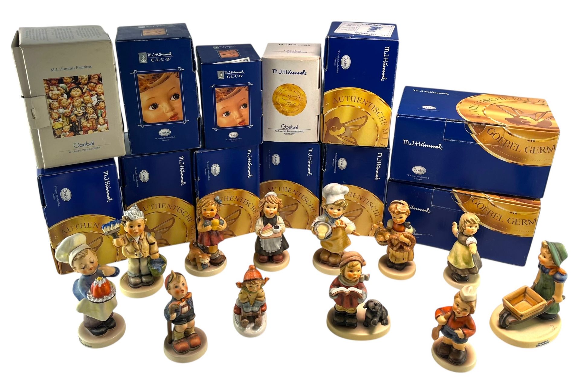 GOEBEL HUMMEL FIGURES - TWELVE BOXED PORCELAIN FIGURINES
