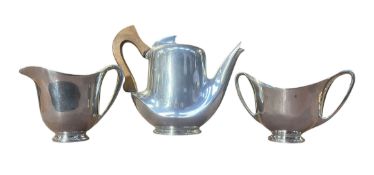 PICQUOT WARE - ART DECO CIRCA 1930S STEEL & TEAK HANDLE THREE-PIECE TEA SET