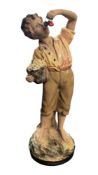20TH CENTURY PLASTER CHERRY BOY FIGURE