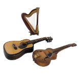 A TRIO OF MINIATURE MUSICAL INSTRUMENTS, HOUSED IN CASES - GUITAR & HARP