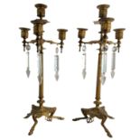 PAIR OF 20TH CENTURY CAST BRASS FOUR LIGHT CANDELABRA
