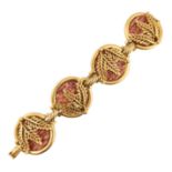A VINTAGE GOLD TONE & WICKER MEDALION STATEMENT BRACELET