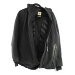 A Hermes black unisex Sports wear Jacket quilted inside with leather trim pockets