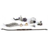 A group of mainly silver costume jewellery items, including a amethyst and peridot arts and craft