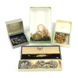 A group of silver and costume jewellery, including a silver cased cocktail watch, a necklace,