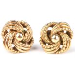 A pair of knot earrings 16mm in diameter with post and butterfly fittings, tested as 9 ct,