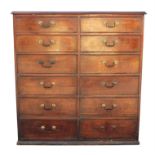 A large George III mahogany chest of drawers, the moulded top above two banks of six graduated