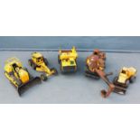 A group of five Tonka toys, to include a Mighty Dozer, mostly distressed, (5)