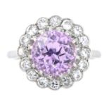 An early 20th century platinum, sapphire and diamond ring