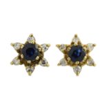 A pair of sapphire & diamond stud earrings