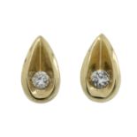 A pair of 9ct gold diamond stud earrings