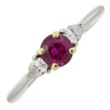 A ruby and pear-shape diamond three-stone ring, by Tiffany & Co.