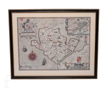 A late 17th Century John Speede hand coloured map of Anglesey within mount, framed 38cm x 51cm.