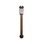 A Georgian period Scottish mahogany cased Stick Barometer, the arched pediment with central finial