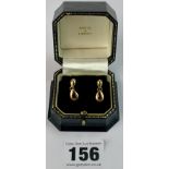 Pair of 18k gold ruby earrings