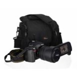 Nikon D5100 digital SLR camera; with Nikon AF-S Nikkor 18-105mm lens; also with instruction