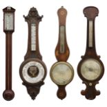 Mahogany stick barometer in the Georgian style; together with a carved oak aneroid barometer, inlaid
