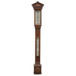 Victorian carved oak stick barometer, with arched pediment, the angled scale signed for J.H.