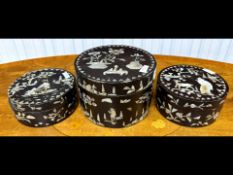 Set of Three Antique Chinese Round Lidded Lacquered Boxes, inlaid with mother-of-pearl, depicting
