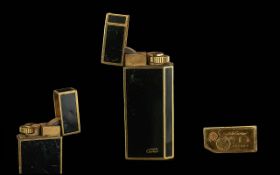 Musk DC Cartier - Signed Gold Plated and Black Stylish Deluxe Lighter, Ref Number 88209. Good