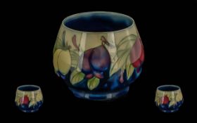 William Moorcroft Signed Small Bowl 'Wisteria' design, circa 1920's. 2.75'' high x 3'' diameter.