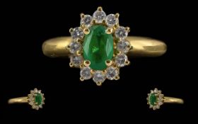 Ladies 18ct Gold Pleasing Quality Emerald & Diamond Set Ring, not marked tests 18ct. The central