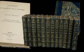 Captain Marryat -.a fine set of 12 tomes with leather and gilt anchor spines, with marbled boards,