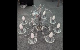 Chrome Chandelier Style Light Fitting, with eight branches and crystal prisms.