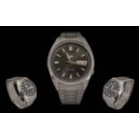 Seiko 5 Gents Stainless Steel Automatic Watch - Ref 7526-0394. Features; Black Dial, Silver &