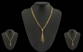 Ladies Excellent Quality 9ct Gold Multi-Strand Necklace with Tassel and Ball Design Drop.