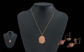 Ladies - Pleasing Quality 18ct Gold Coral Set Pendant Attached to a 18ct Gold Chain. Marked 750