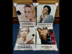 Four Chanel Advertising Posters, all framed, comprising Chanel No. 19, two Cristalle, and an