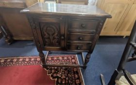 Jacobean Style Oak Hall Stand, three drawers, panelled sides, cross stretch, turned supports.
