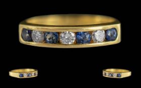 Ladies - Excellent 18ct Gold Channel Set Sapphire / Diamond Set Ring. Full Hallmark to Shank. The