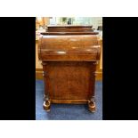 Victorian Walnut Davenport of typical form, fitted interior. Four side drawers and four dummy