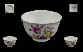 Meissen Marcolimi period tea-bowl finely decorated with the seasons flowers picked out in green
