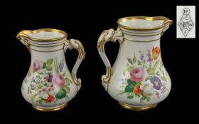 Fine pair of decorated floral jugs, with lion mask handles, presented to J J Mason. Dated 1860, with