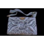 Genuine Louis Vuitton Maxi Multi Pochette, Navy Blue, crafted from quilted Econyl nylon fabric