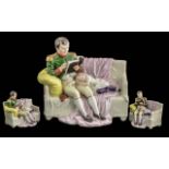 Small Collection of Porcelain, a German Scheibe-Alsbach figure of Napoleon Bonaparte reading with