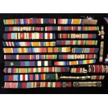 22 Ribbon Bars, original from WWi and WWII, some with pips and oak leaves.