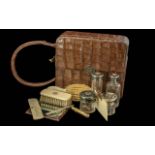 Leather Cased Ladies Crocodile Vanity Case, of small size, stamped by Finnigans, New Bond Street,