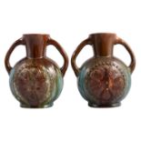 Dr Christopher Dresser for Linthorpe Pottery, a pair of Aesthetic movement vases