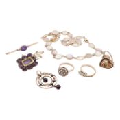 A 9ct and seed pearl cluster set ring, size K, a 1970's 9ct gold and garnet set heart shaped ring,