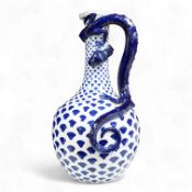 A late 19th century Royal Worcester jug with dragon handle, in unusual blue colourway, 30cm