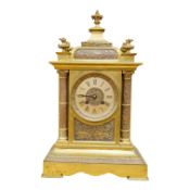 A late 19th century brass mantel clock with French gong-striking movement, 38cm high