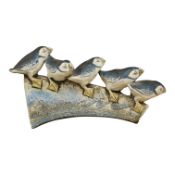 A Blandine Anderson studio ceramic sculpture, of Puffins on a ledge, 31cm wide