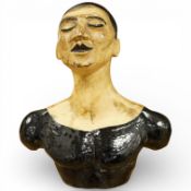 A Commedia dell Arte style pottery bust, 14cm