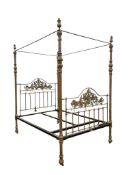 A late 19th century Continental embossed brass four poster double bed frame, width 154cm, length