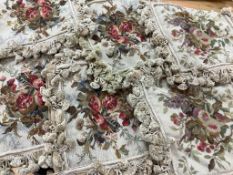 Four square wool worked fruit design tasselled cushion covers and two similar lighter peach designed